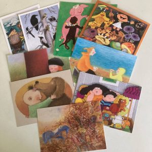 Kuvassa Lastenkirjainstituutin korttivalikoiman kortteja.